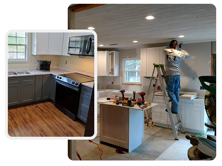 A man standing on the ladder in front of a kitchen.