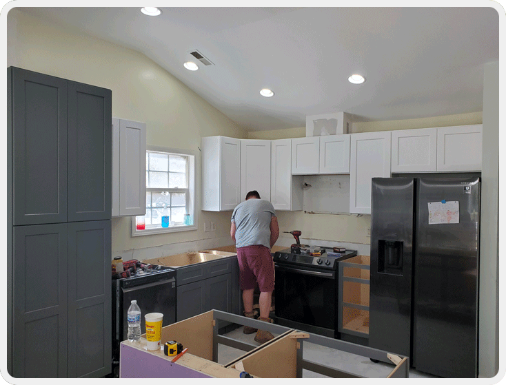 A person in the kitchen preparing food.