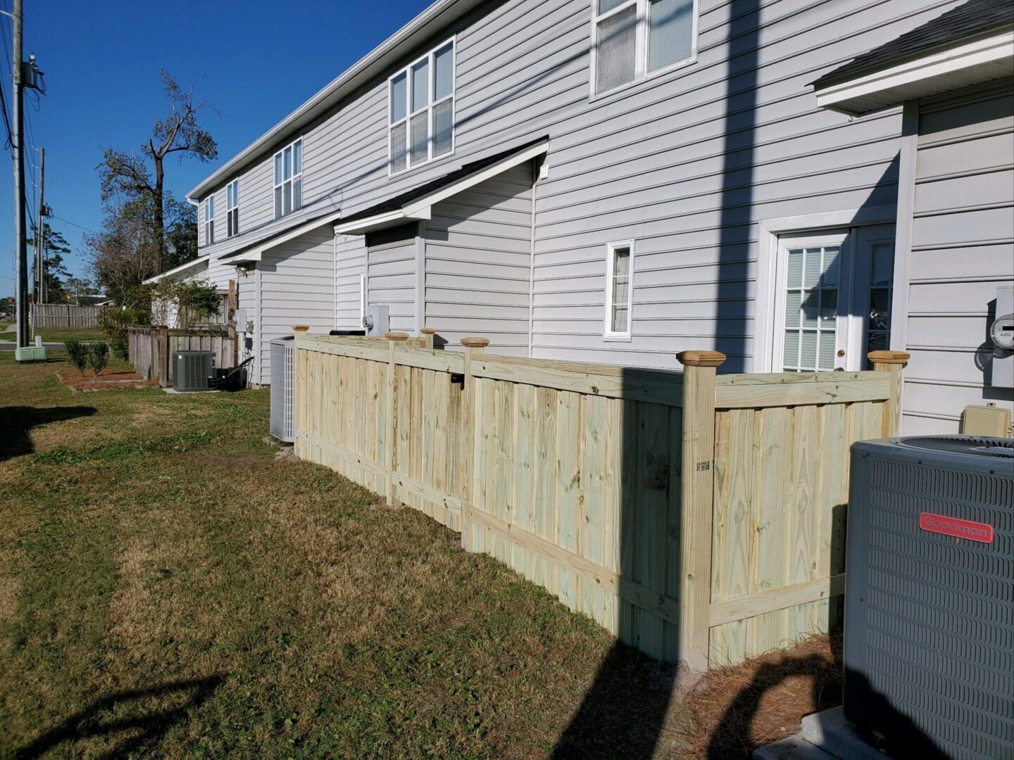 A fence that is being built around the house.